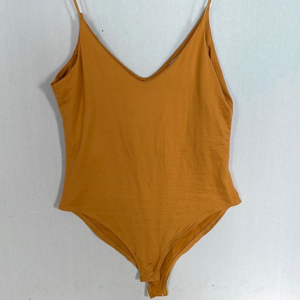 Golden body suit